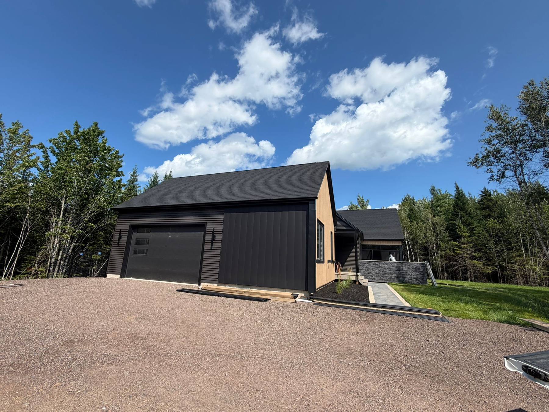 Attached garage and driveway of the completed home